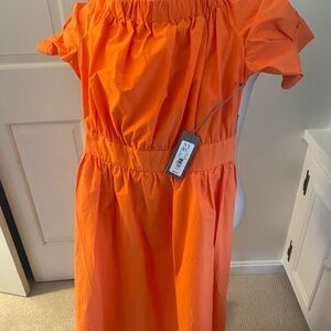 Eva Mendez Vibrant Orange Off-Shoulder Dress
